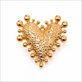 Golden heart-shaped button cover
