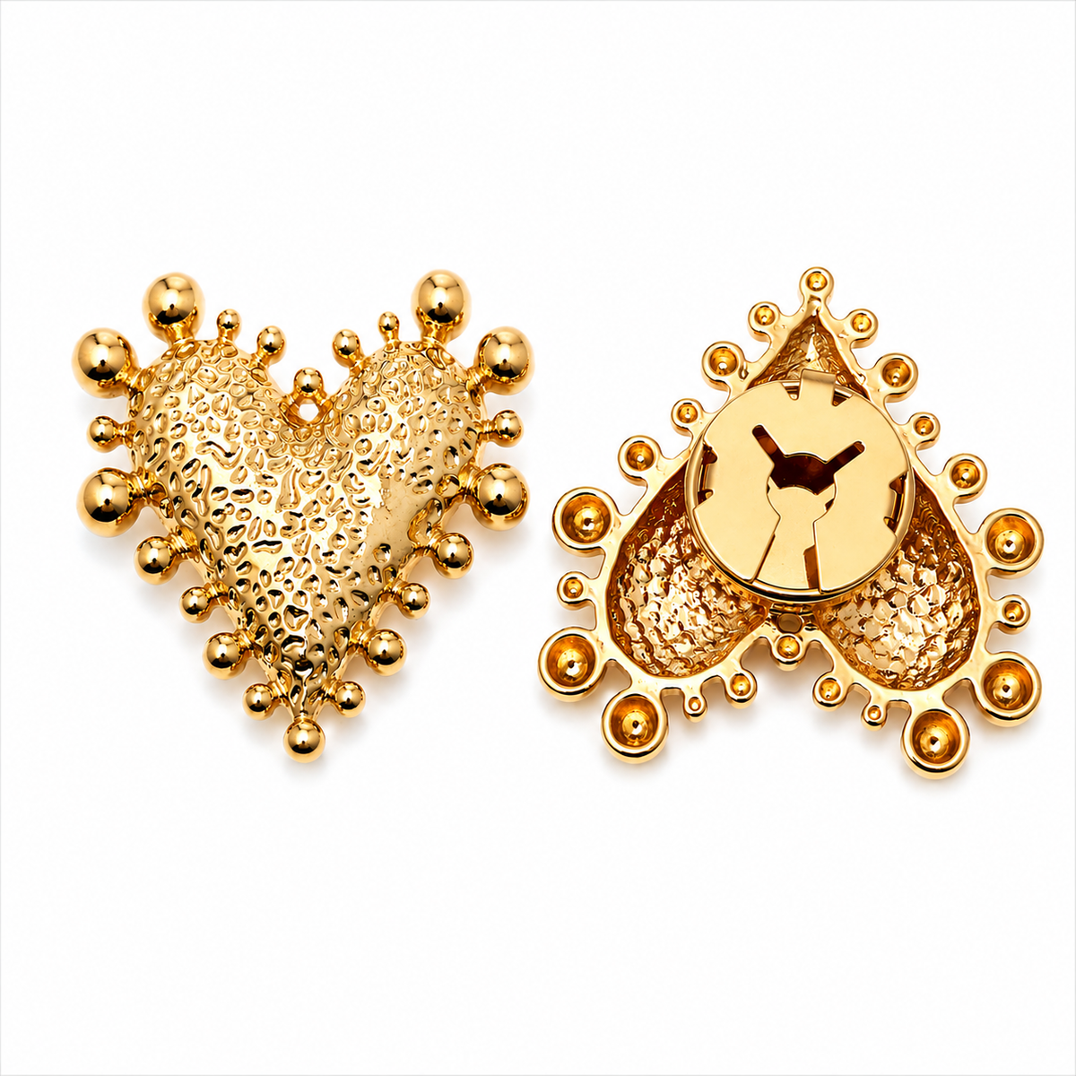 Golden heart-shaped button cover